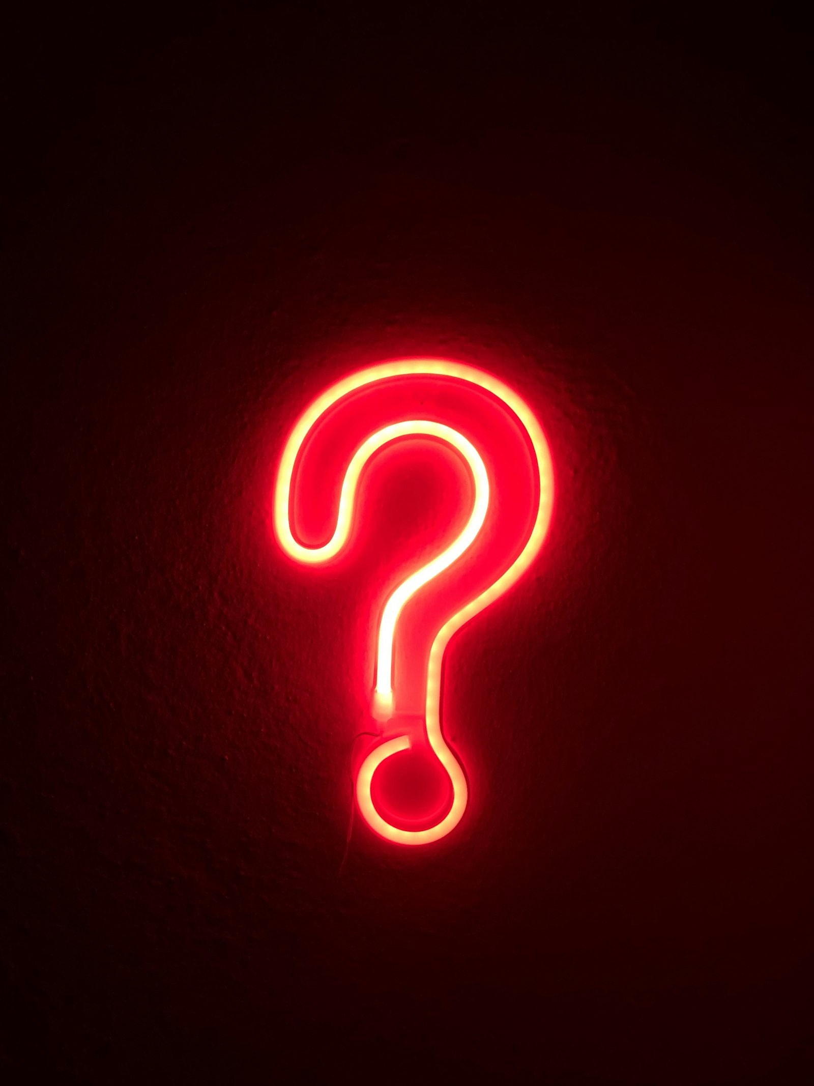 Red neon question mark