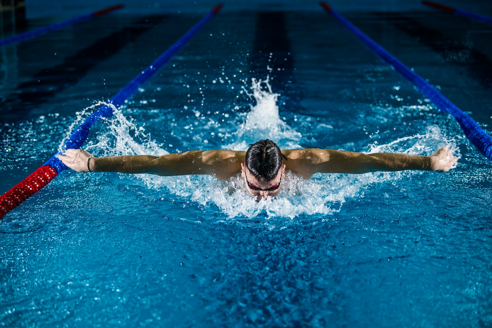 Butterfly swimmer powering through the water